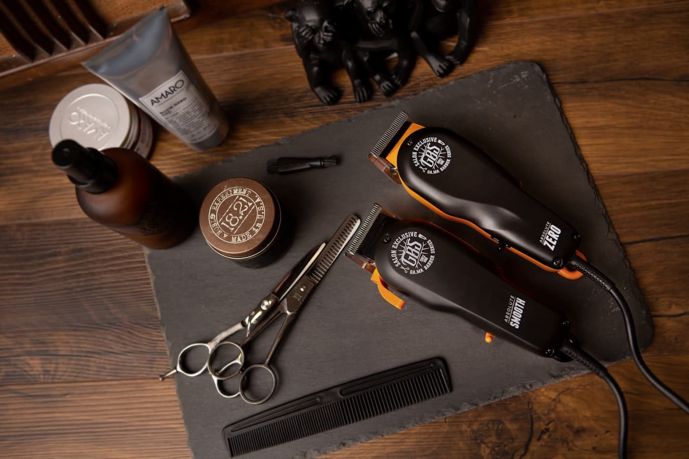 A reclined client receiving a traditional shave and beard work at the atelier