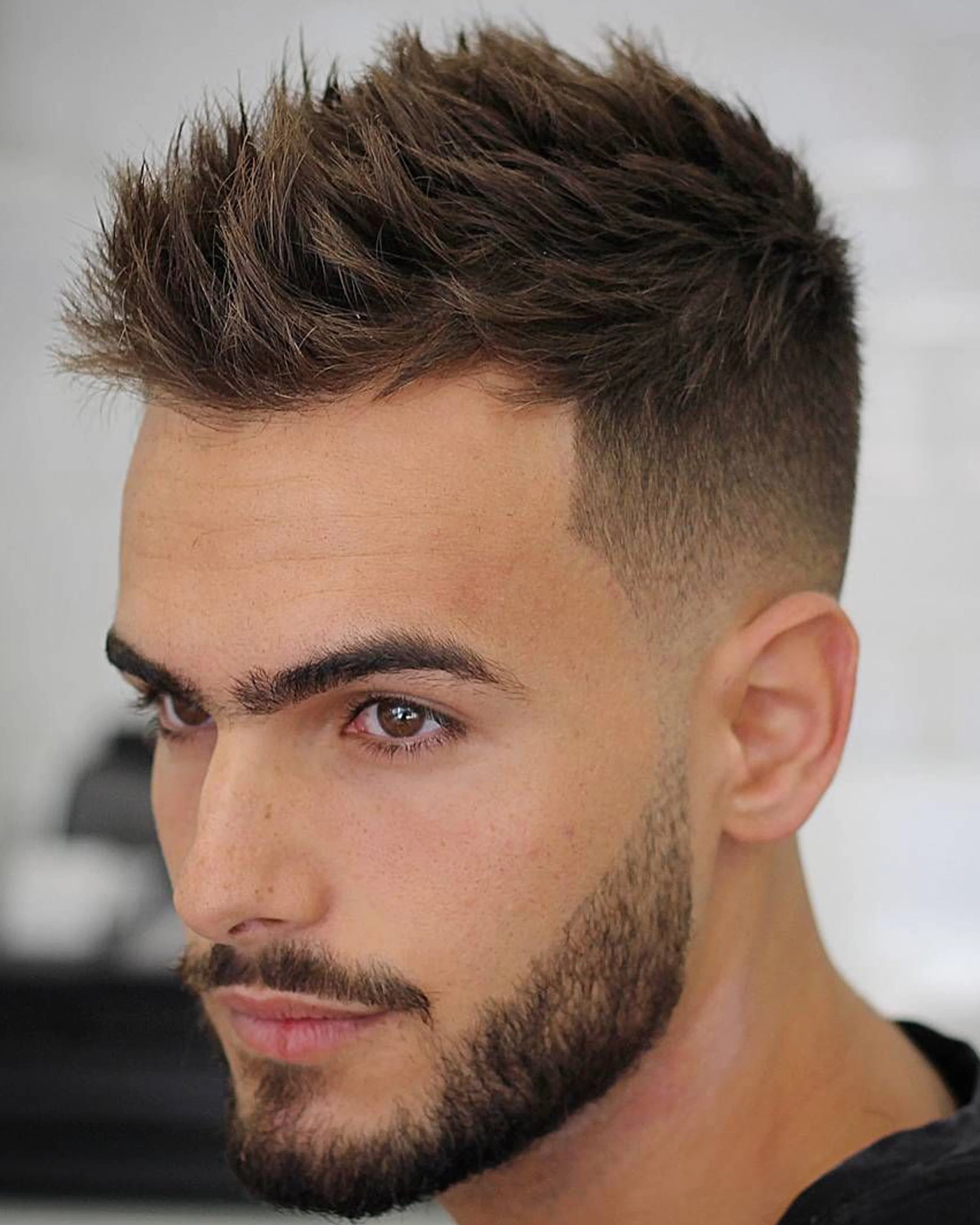 A precision beard grooming with steam towel